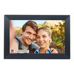 Digital photo frame displaying a couple outdoors with a scenic background