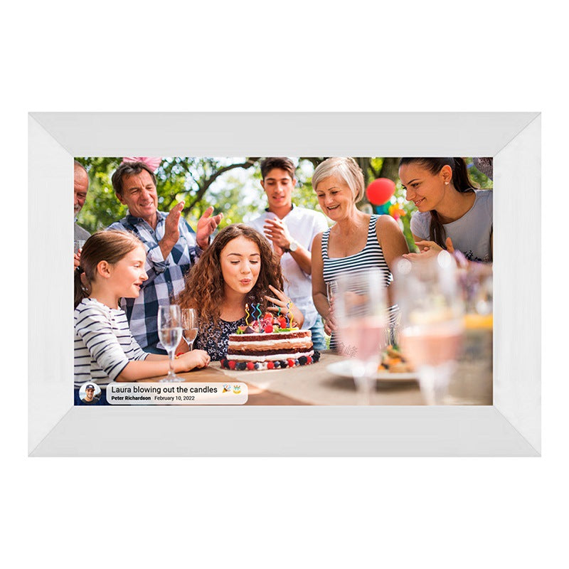Digital photo frame displaying a birthday scene with a family and cake.
