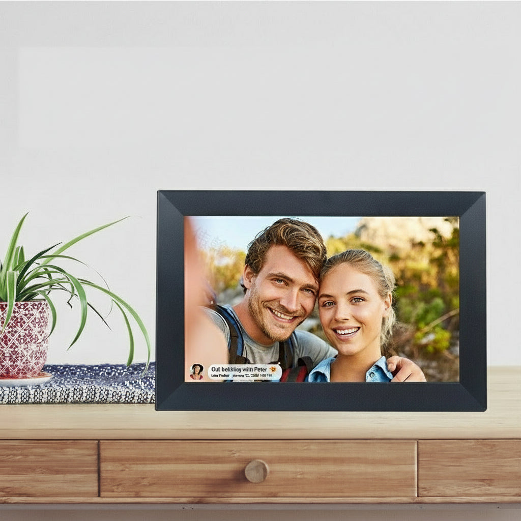 Digital photo frame displaying a couple's photo with icons indicating features like WiFi and app usage on a light gray background.